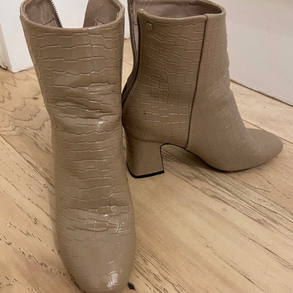 Snake skin ankle boot.